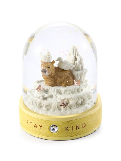 Schneekugel „Stay Kind – Die Freundlichkeit“ mit Capybara, Symbol für Güte und Freundschaft