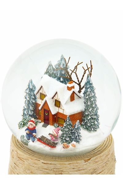 Grande boule à neige de Noël lumineuse avec chalet enneigé et effet de neige automatique