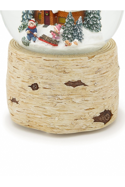 Grande boule à neige de Noël lumineuse avec chalet enneigé et effet de neige automatique